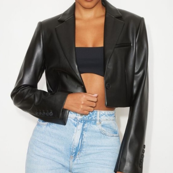 Dynamite, small black faux like leather. - Picture 1 of 8